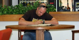 man studying at a table