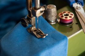 sewing machine with fabric being sewn